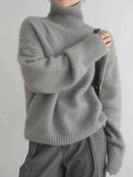 Pull Col Roulé Oversize en Maille — Femme